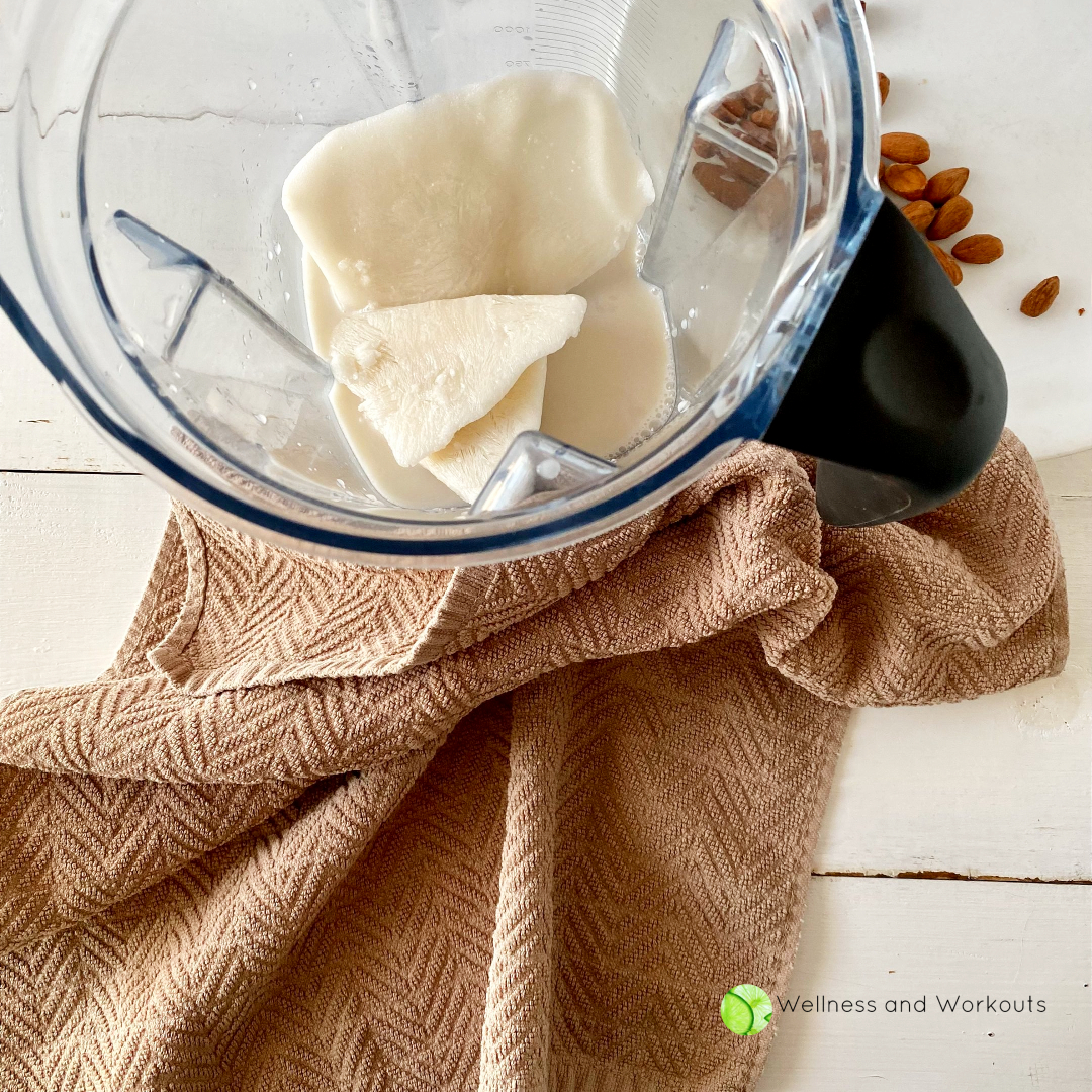 Broken pieces of almond milk thinly frozen in a baggie in my Vitamix blender, ready to add smoothie ingrients.