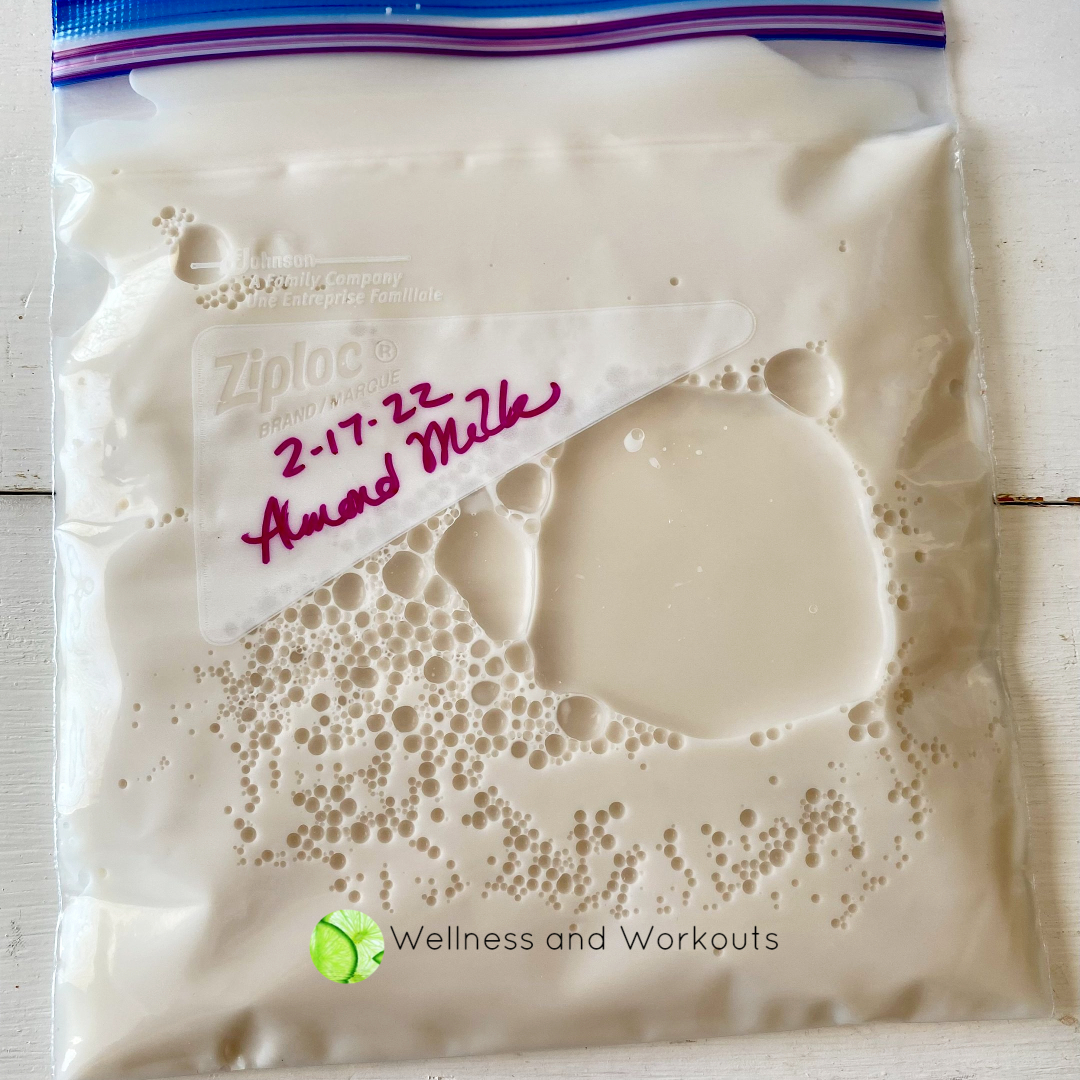 Almond milk in a plastic freezer quart baggie ready to lay on a plate to freeze so that the liquid will be thin and easy to defrost quickly.